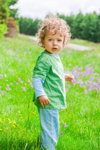 Little boy with blonde hair aged 1