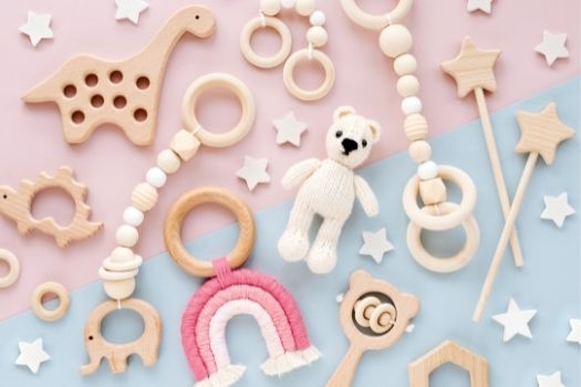Mixture of toys on blue and pink background
