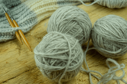 Knitting a light green blanket