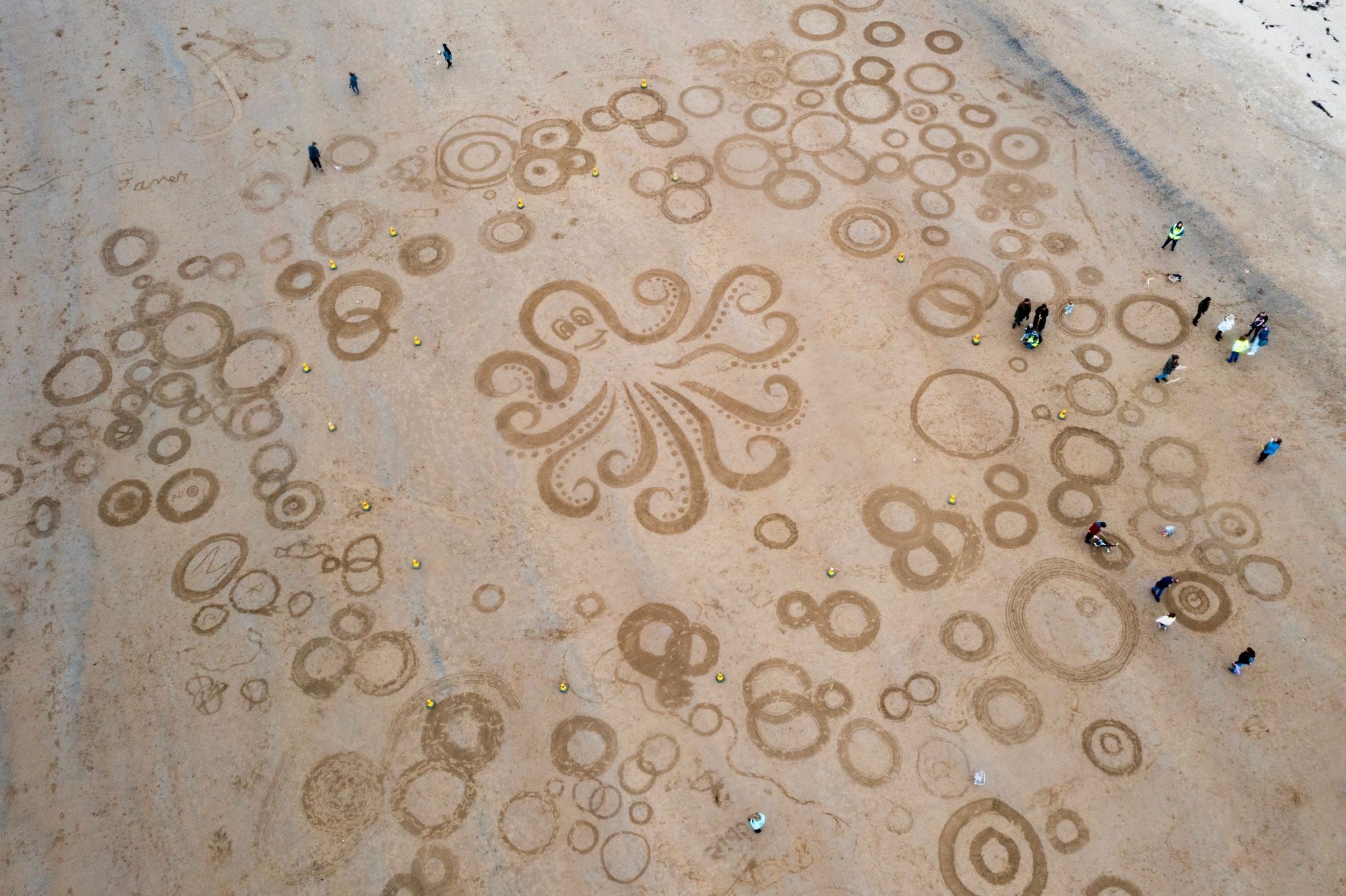 Aerial photograph of sand art octopus design 